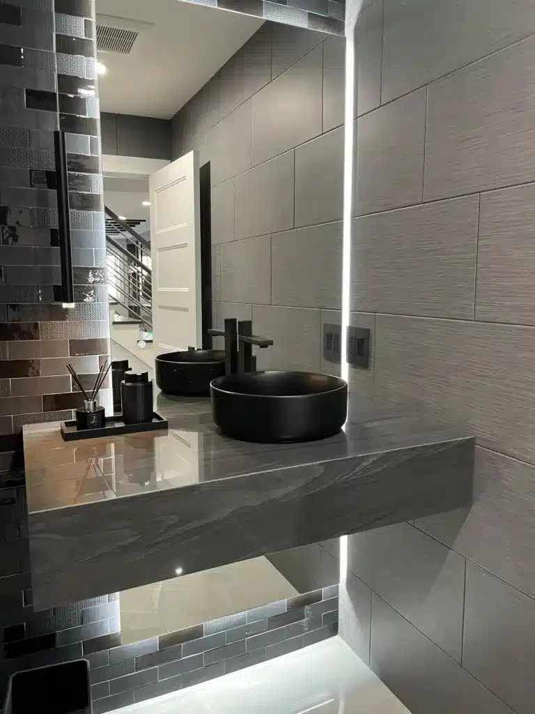 Next Marble & Granite specialist working on a high-quality kitchen countertop.