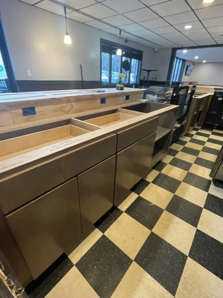 Expert team installing a custom granite countertop in Massachusetts.