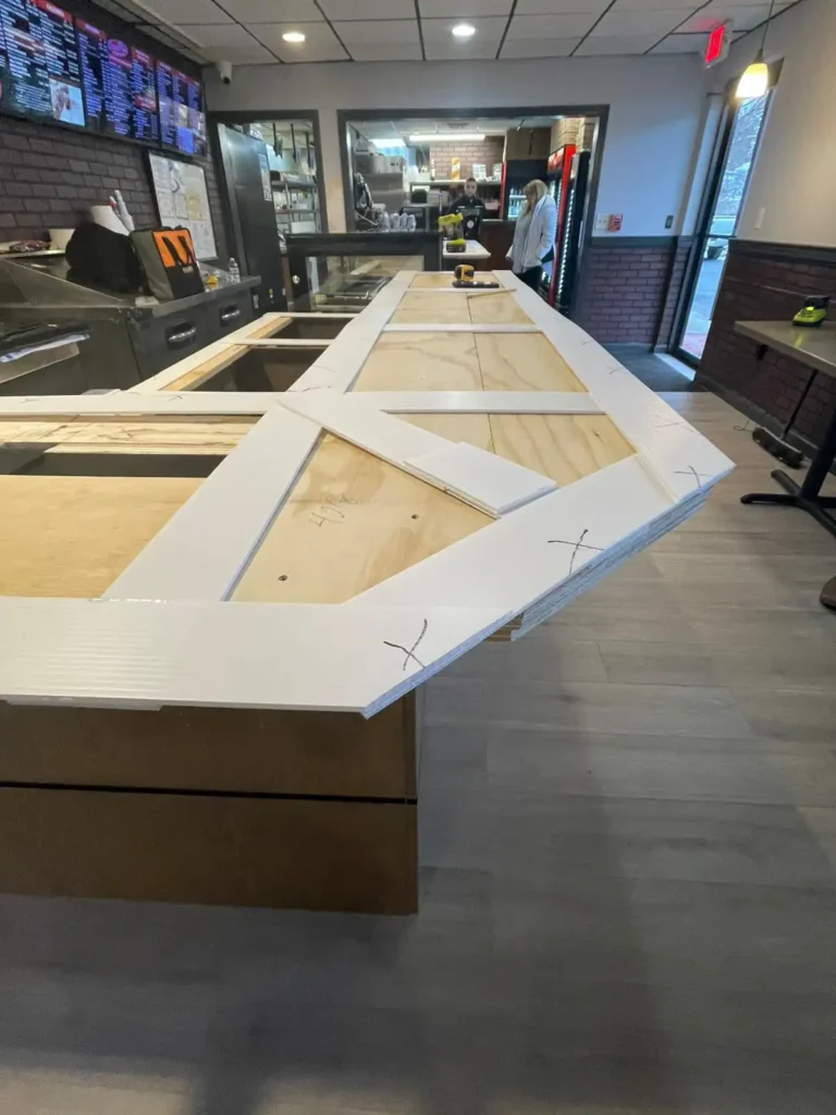 Expert team installing a custom granite countertop in Massachusetts.